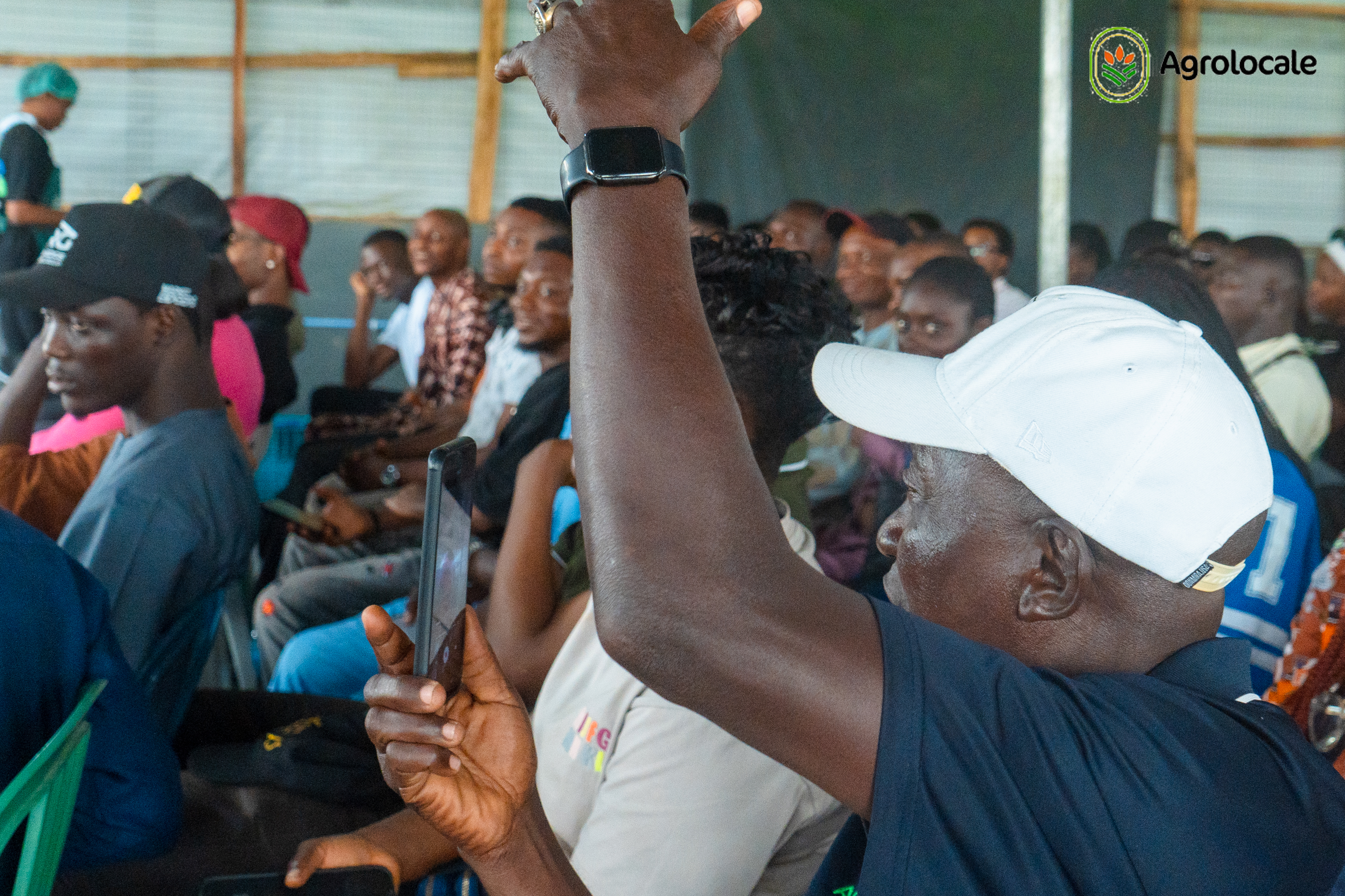 A man with a white cap at agrolocale allocation